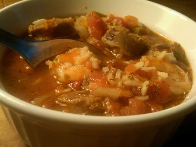 Delicious shrimp and sausage jambalaya soup in a hearty, inviting bowl ready to savor.