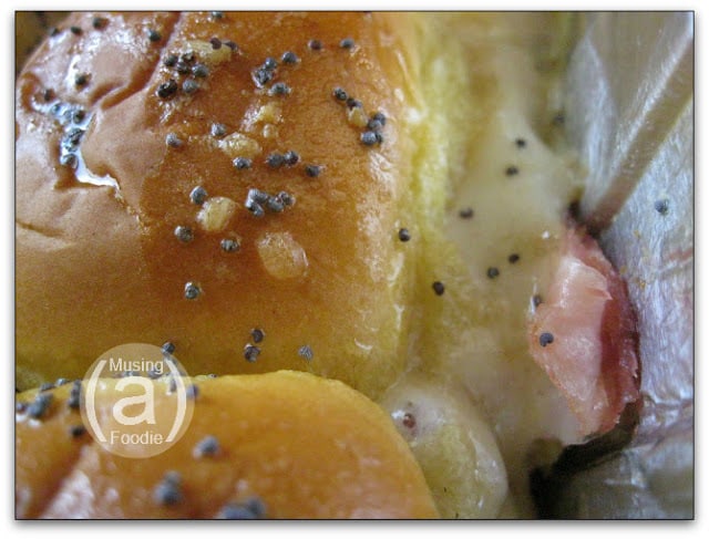 Savory cheesy ham slider buns, perfect for party snacks and casual gatherings.