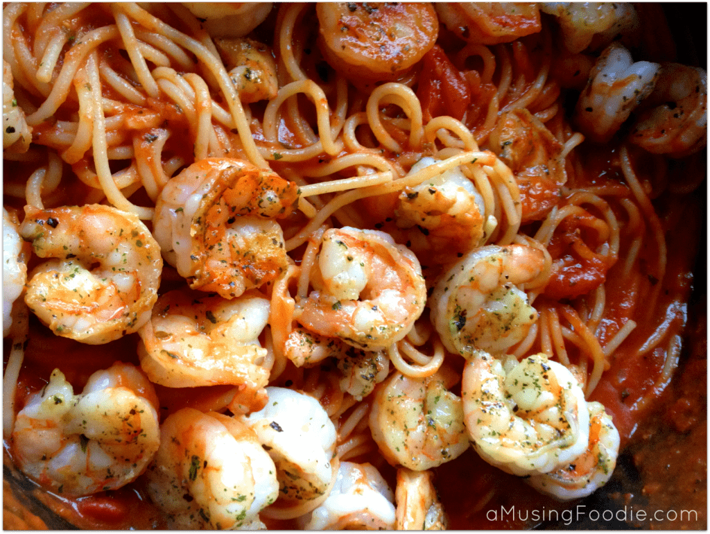 Delicious shrimp pasta with creamy tomato sauce, perfect for a cozy dinner or special occasion.
