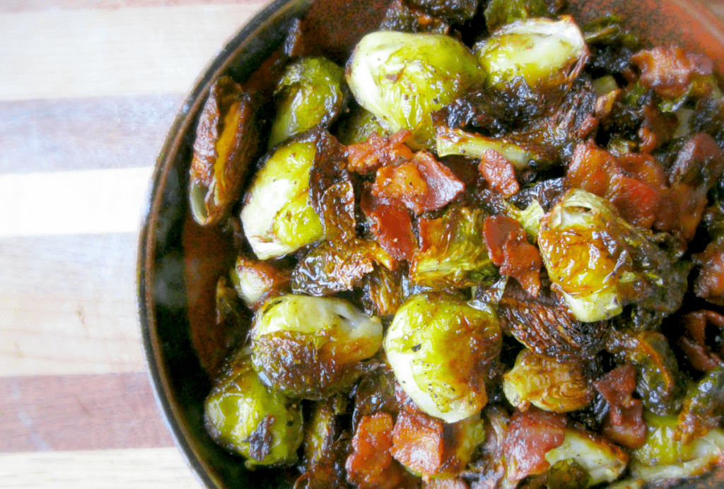Savory roasted Brussels sprouts with crispy bacon, a delightful and colorful side dish.