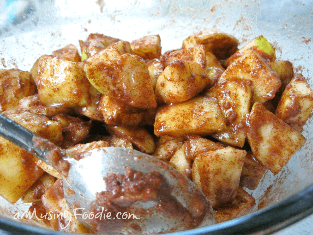 Sweet diced apples in a sticky honey cardamom glaze, perfect for desserts or toppings.