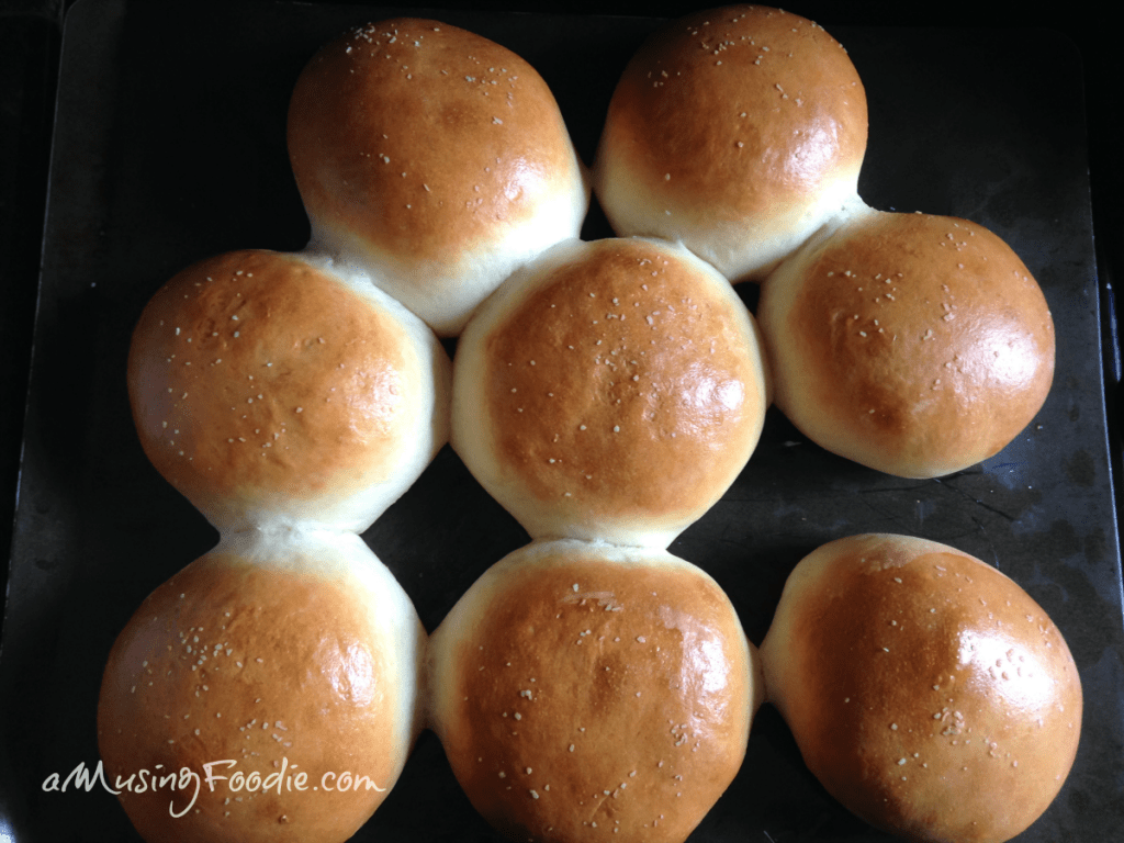 Freshly baked golden dinner rolls, soft and fluffy, perfect for any meal or gathering.