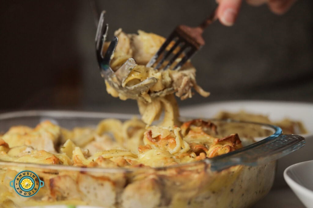 creamy chicken pasta bake being served