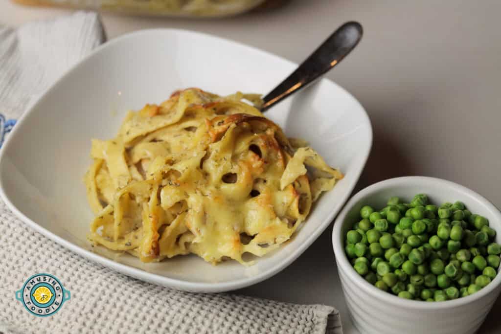 Creamy chicken pasta bake with peas