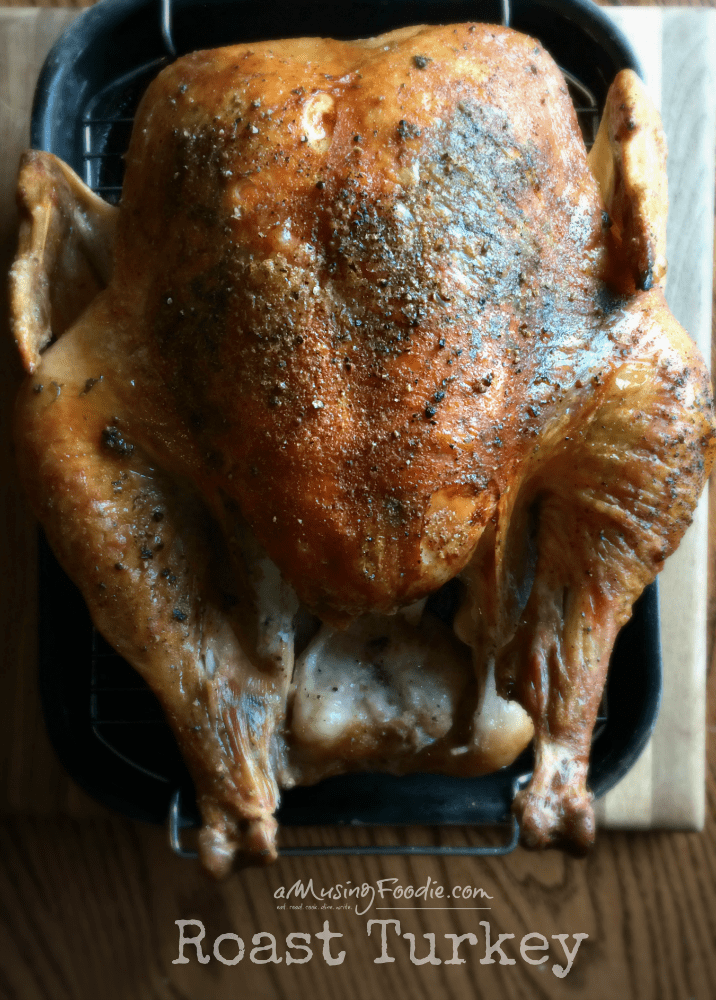 Deliciously roasted turkey, golden brown, perfect for holiday feasts and family gatherings.