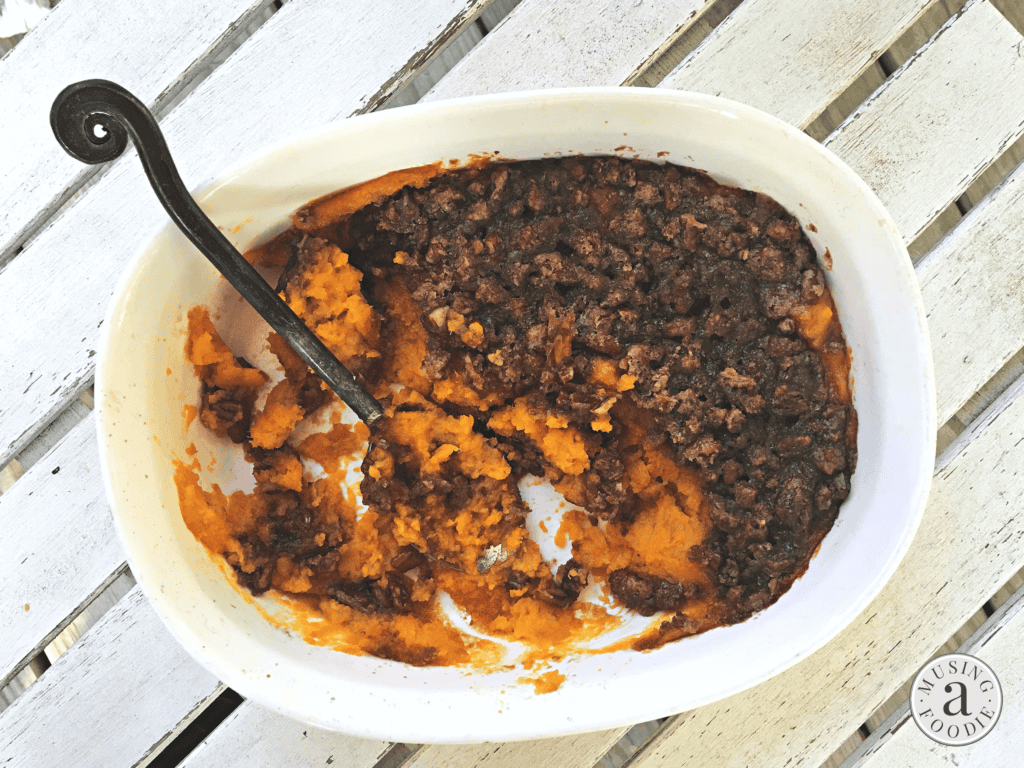 Savory sweet potato casserole topped with a crunchy brown sugar streusel. Perfect for gatherings!
