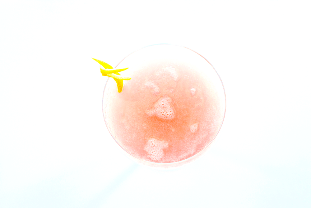 Grapefruit Cocktail using fresh grapefruit, grapefruit peel, and lemon. Bubbly and delicious!