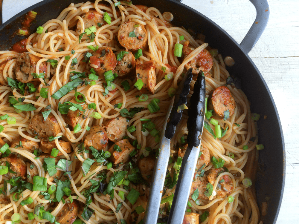 Delicious spaghetti with chicken sausage and fresh herbs for a comforting family dinner.