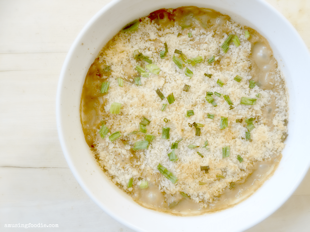 This creamy green bean casserole, with a savory umami twist and crunchy panko topping, will have you reaching for seconds ... and thirds!