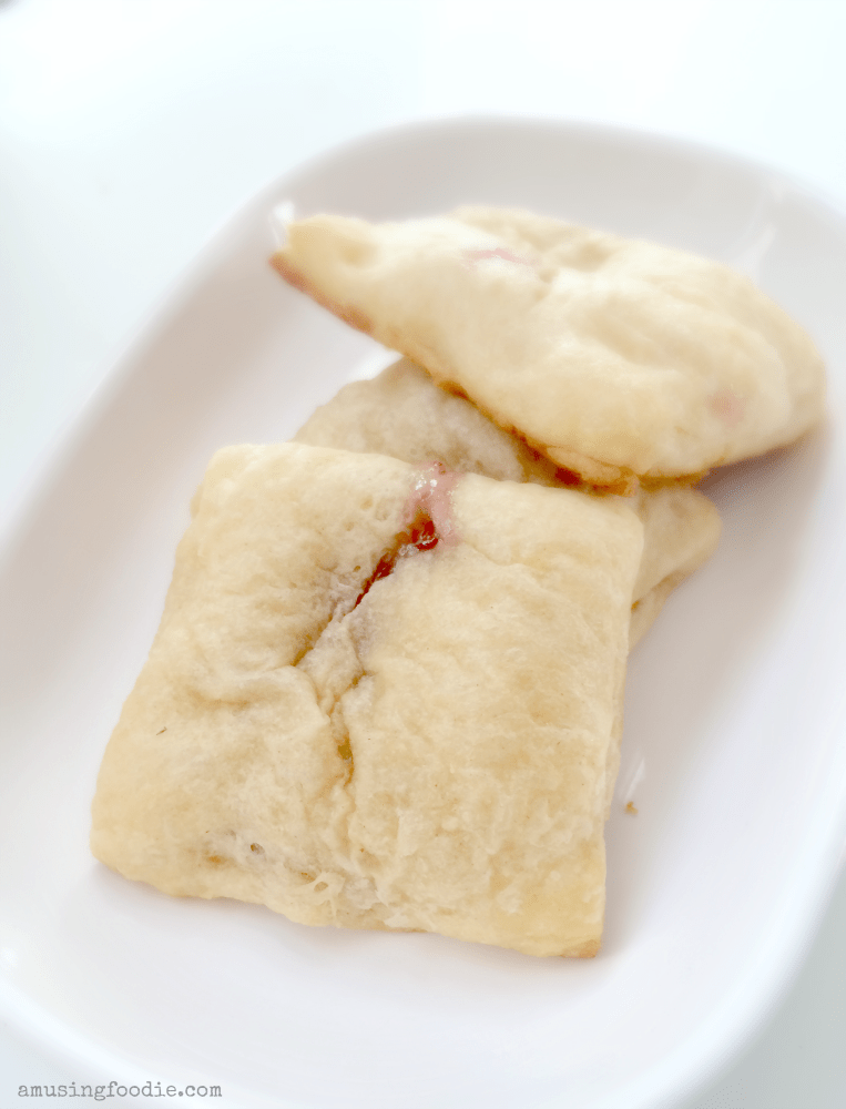 There's nothing better than having a fabulously simple and delicious appetizer in your back pocket. These savory/sweet brie and raspberry crescent roll bites are made with three ingredients, in under 30 minutes. Cheers!