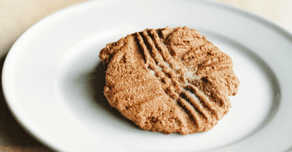 Delicious peanut butter cookie with a crispy exterior and chewy center, perfect for any occasion.