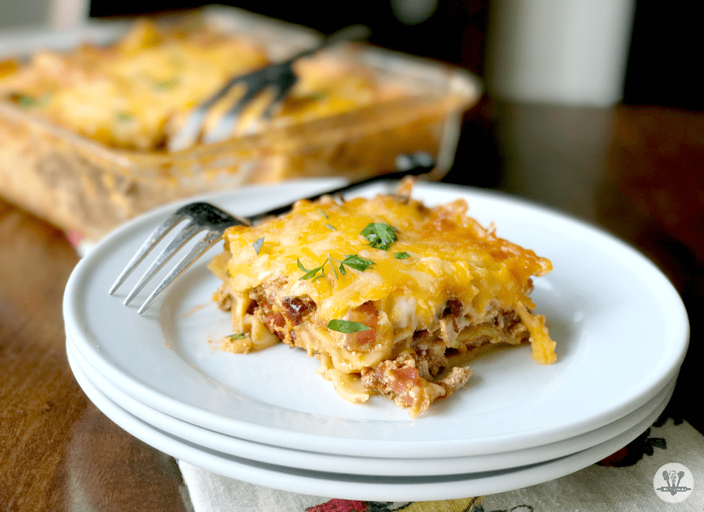 Mouthwatering chipotle chicken lasagna slice, perfect for cozy family dinners or gatherings.