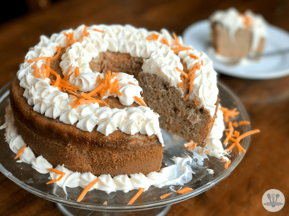 Delicious carrot cake with cream cheese frosting, perfect for any celebration or cozy gathering.