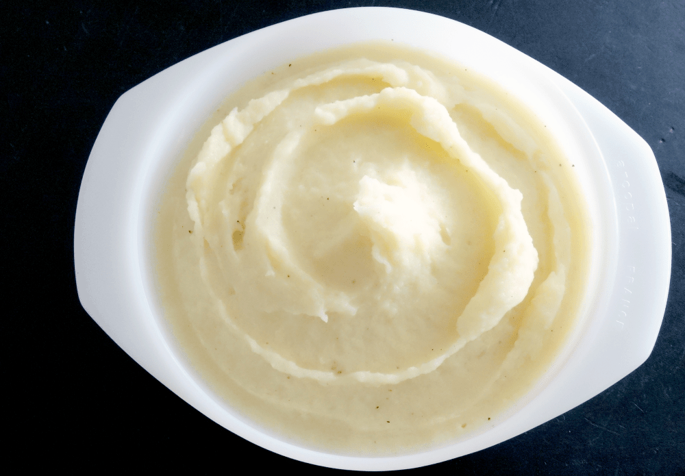 Delicious creamy mashed potatoes, the perfect comfort food for any holiday meal.