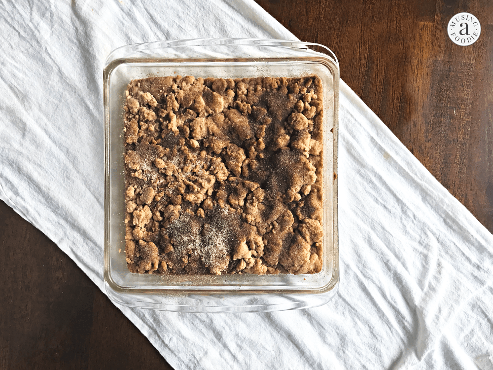 Indulge in soft, chewy Snickerdoodle cookie bars topped with a cinnamon crunch for ultimate bliss.