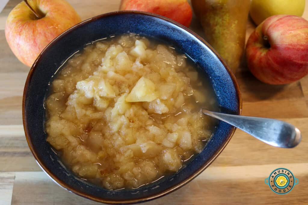 Apple sauce in a bowl with spoon