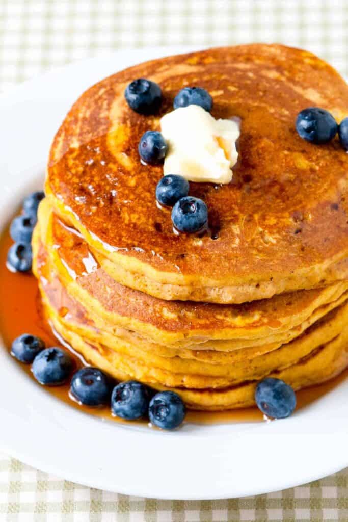 Pumpkin pancake with butter and blueberries