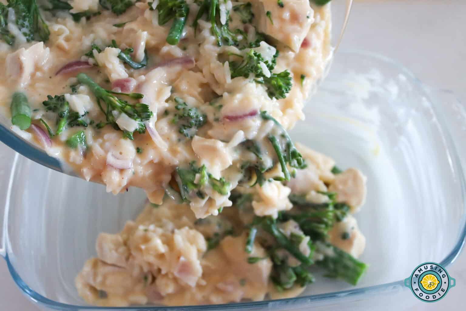 Pouring the chicken and broccoli mix on casserole