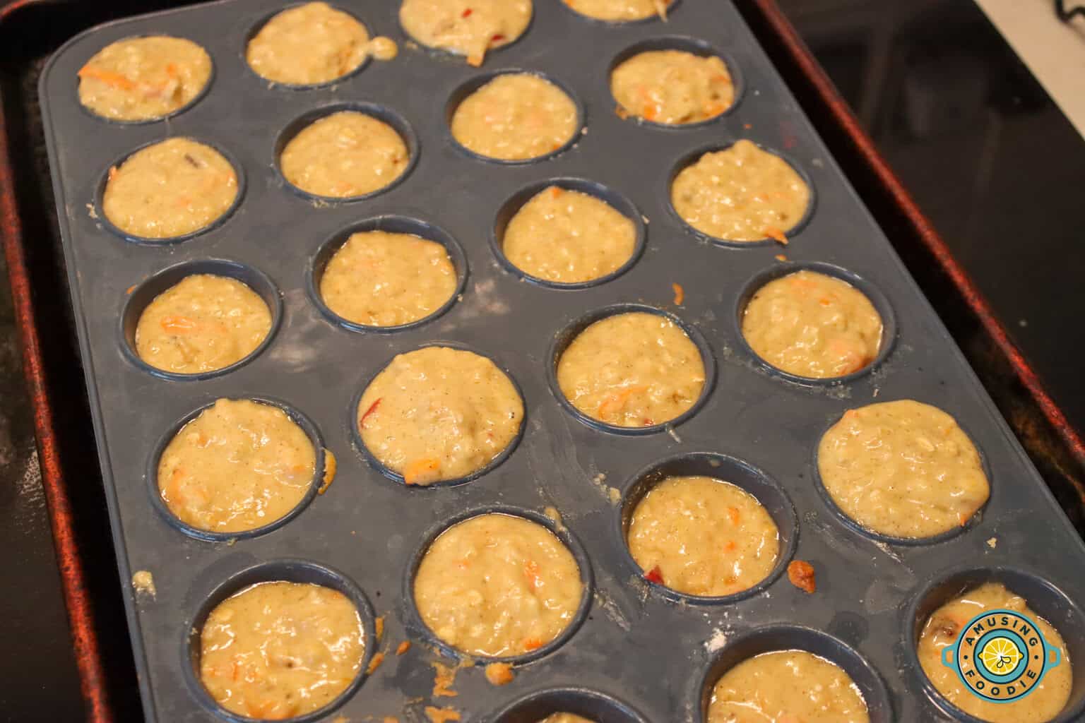 ABC Muffin mixture on muffin baking tray