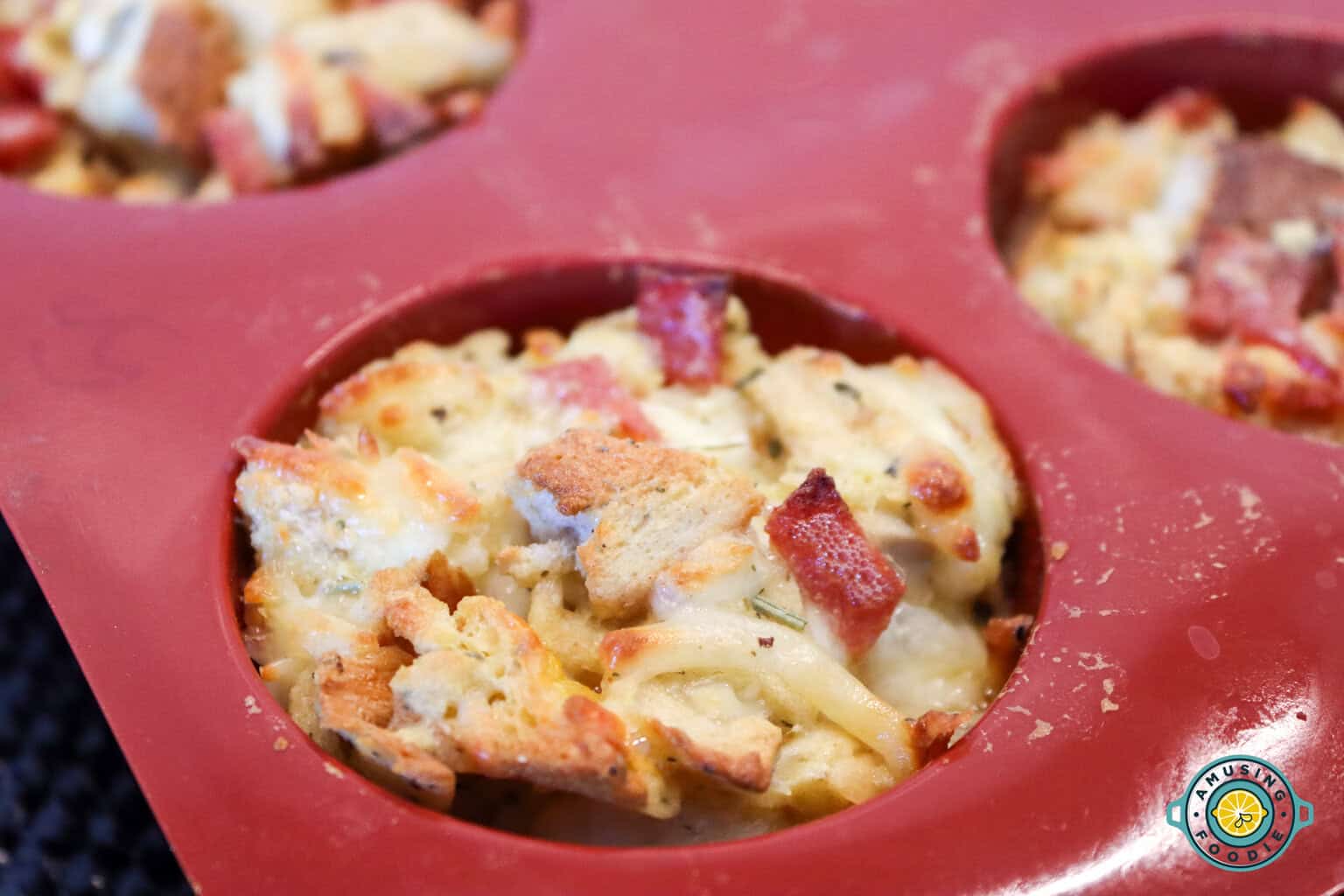 closeup baked pizza muffin on mold