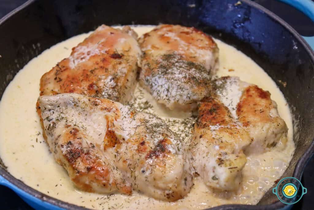 Creamy Lemon Dill Skillet Chicken topped with basil