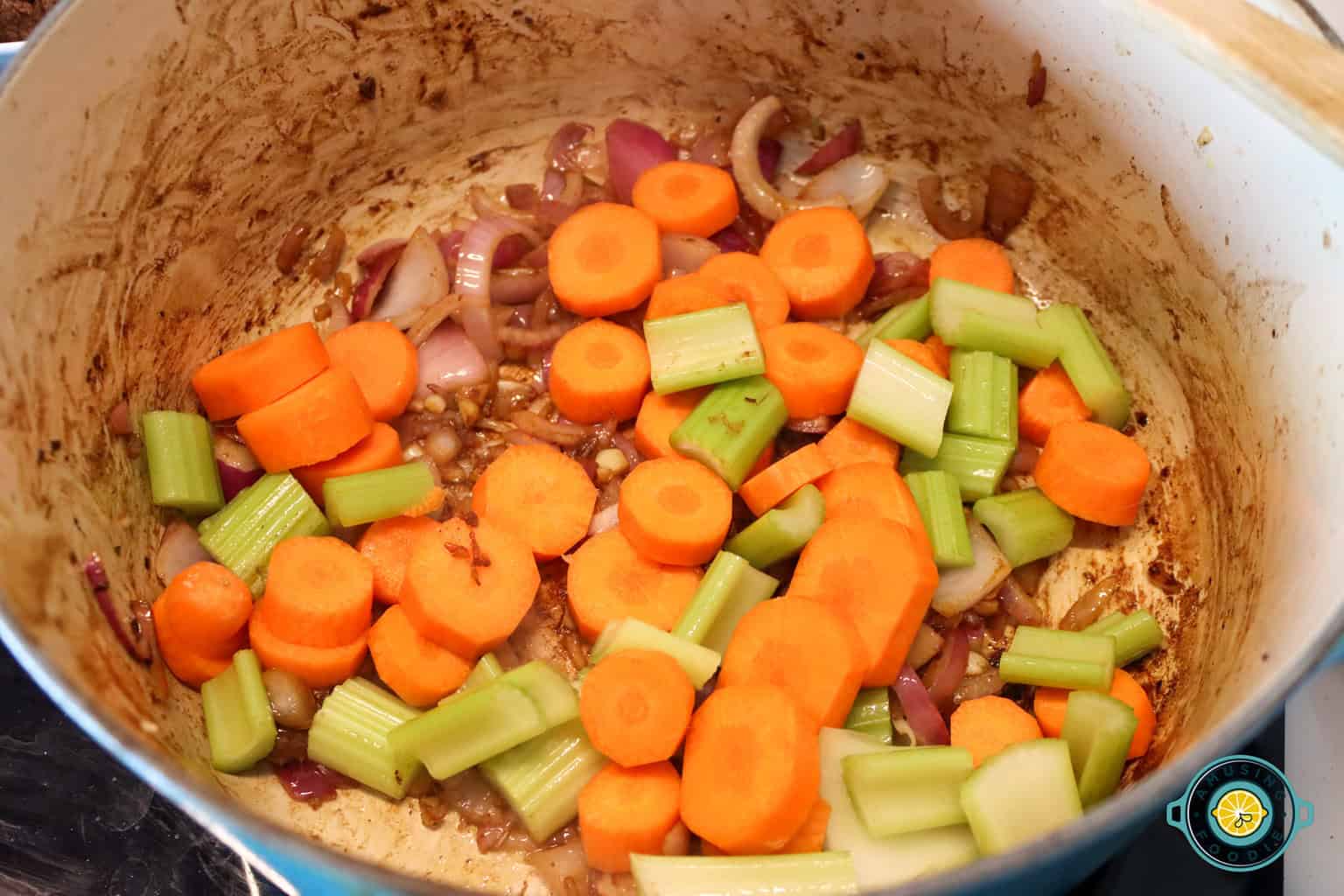 Sauteing garlic, onion, carrots and celery