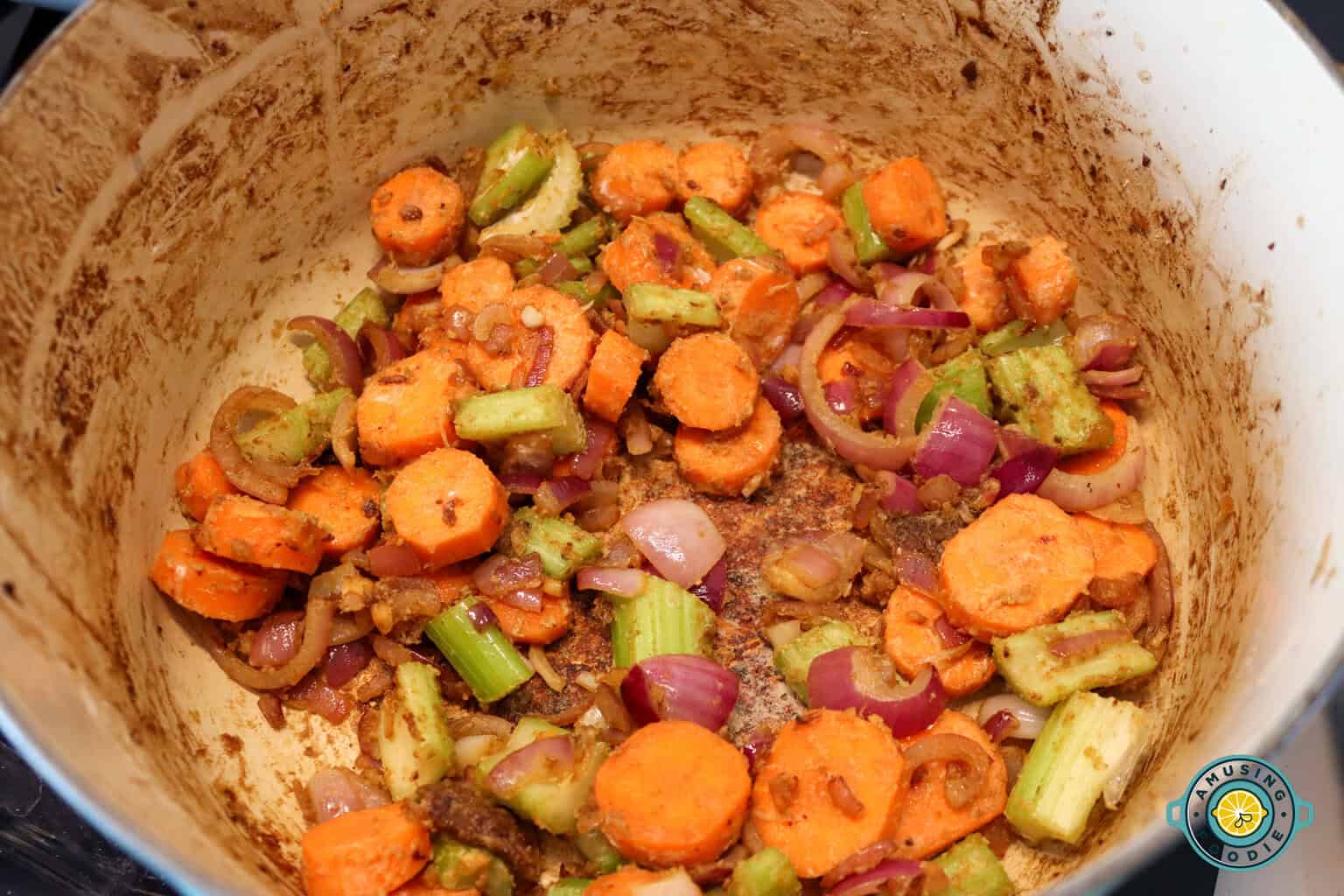 Sauteing garlic, onion, carrots and celery
