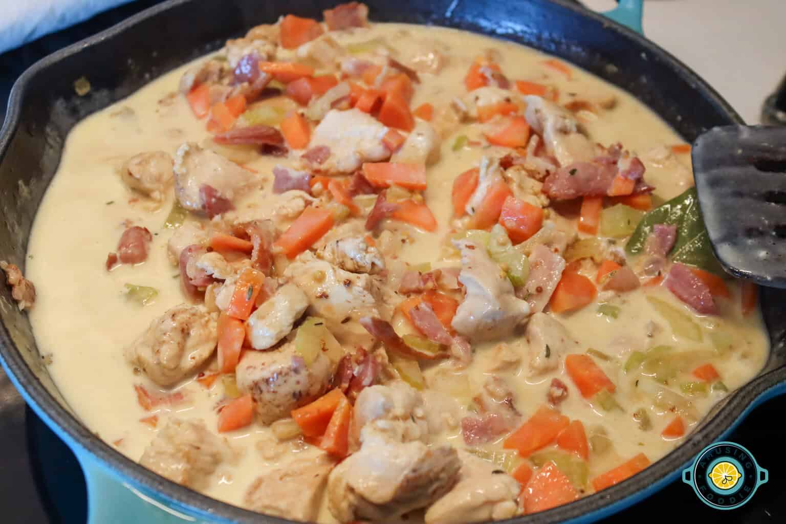 Simmering Ingredients of chicken and bacon pie