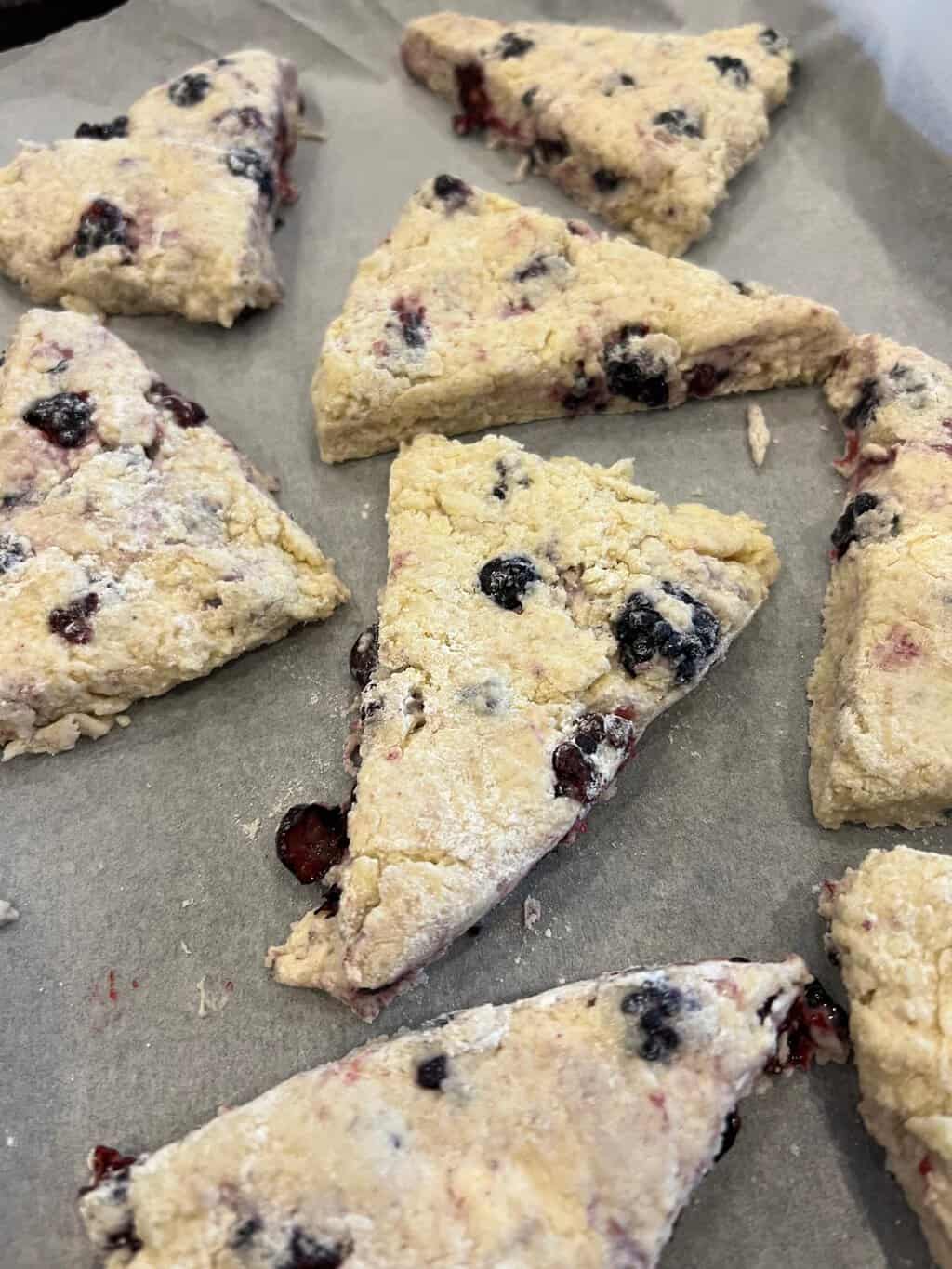 Blackberry scone dough in a pan